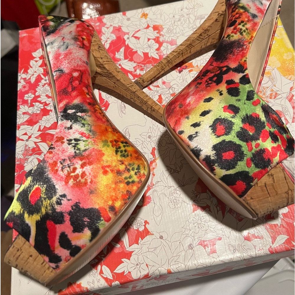 Colorful peep toe pumps with a cork style heel. Worn in a fashion show only.